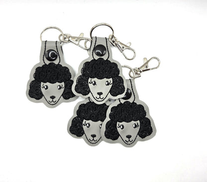 One Poodle Head Keychain – Black & Grey or White & Pink Embroidered Snap Tab