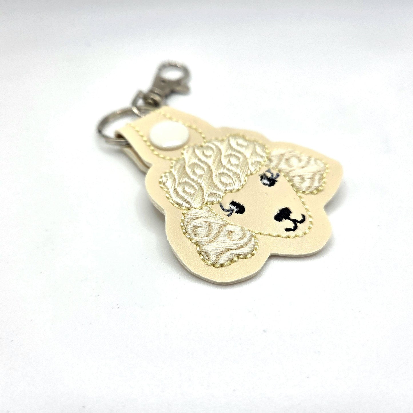 Poodle Head Keychain – Cream Embroidered Snap Tab