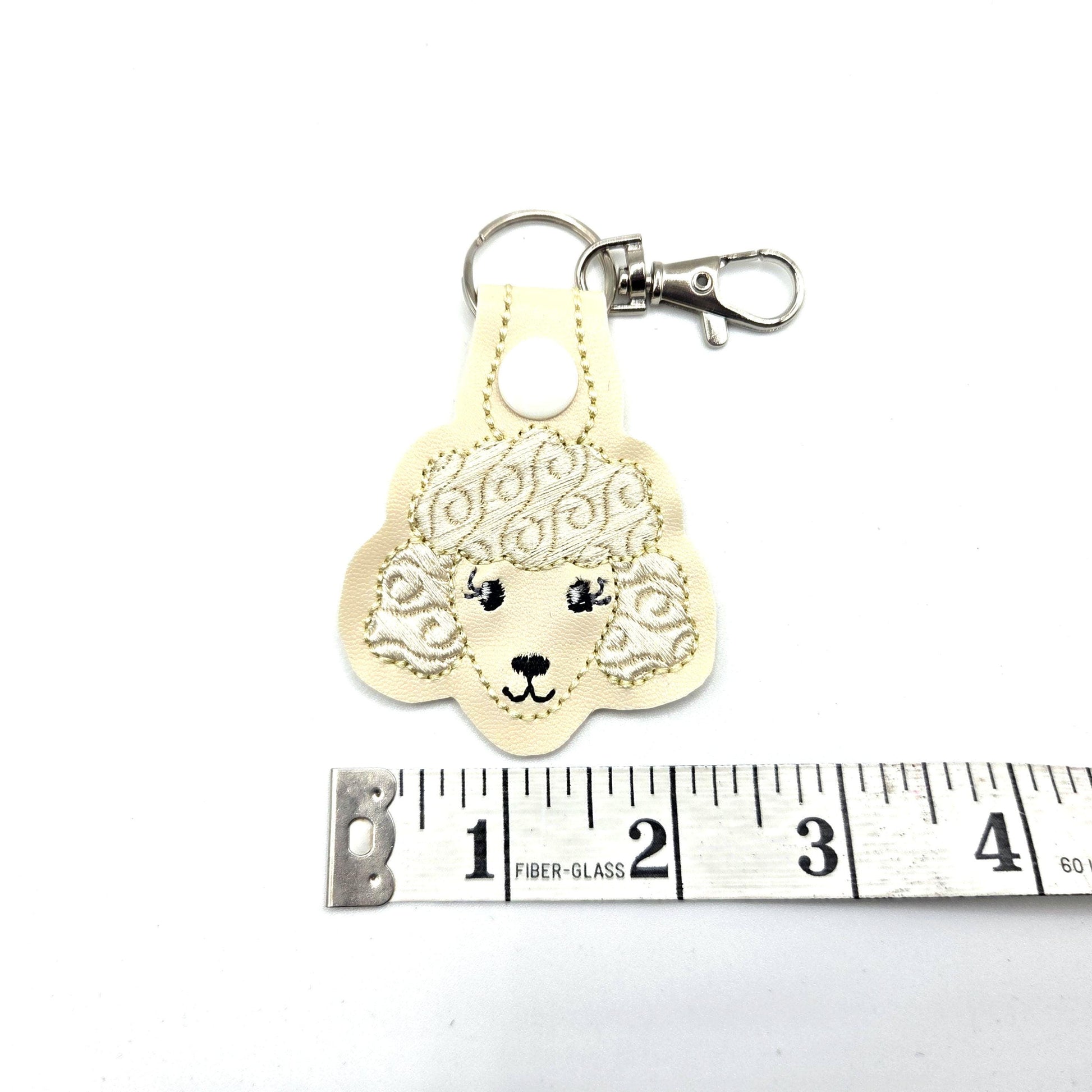 Poodle Head Keychain – Cream Embroidered Snap Tab