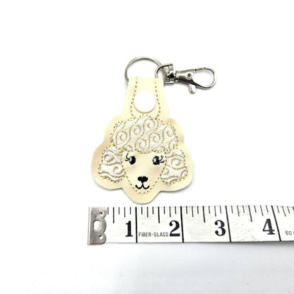 Poodle Head Keychain – Cream Embroidered Snap Tab